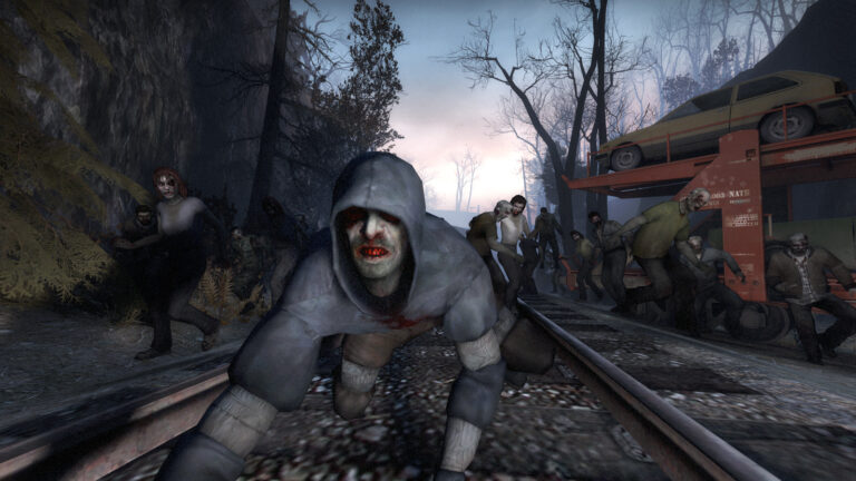 Horde of zombies lurch along railroad tracks toward the viewer, with a car on a red trailer in the background at dusk in a forested area.